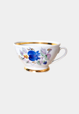 vintage teacup with blue flowers